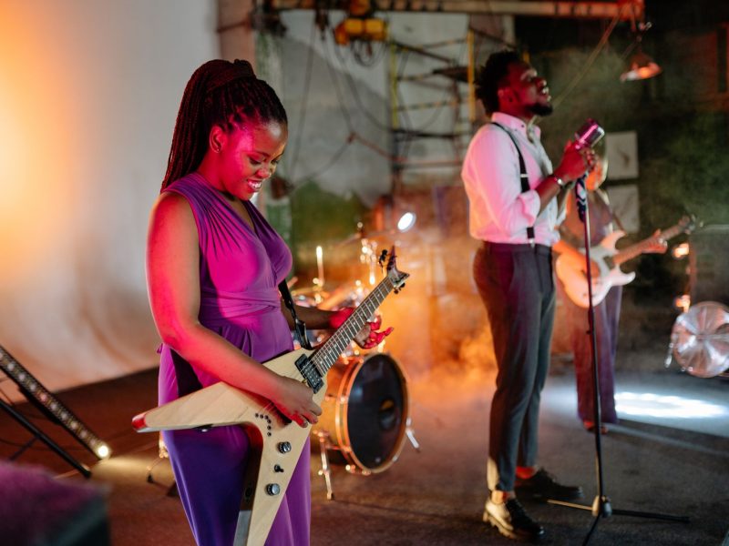 Bassist and singer performing together
